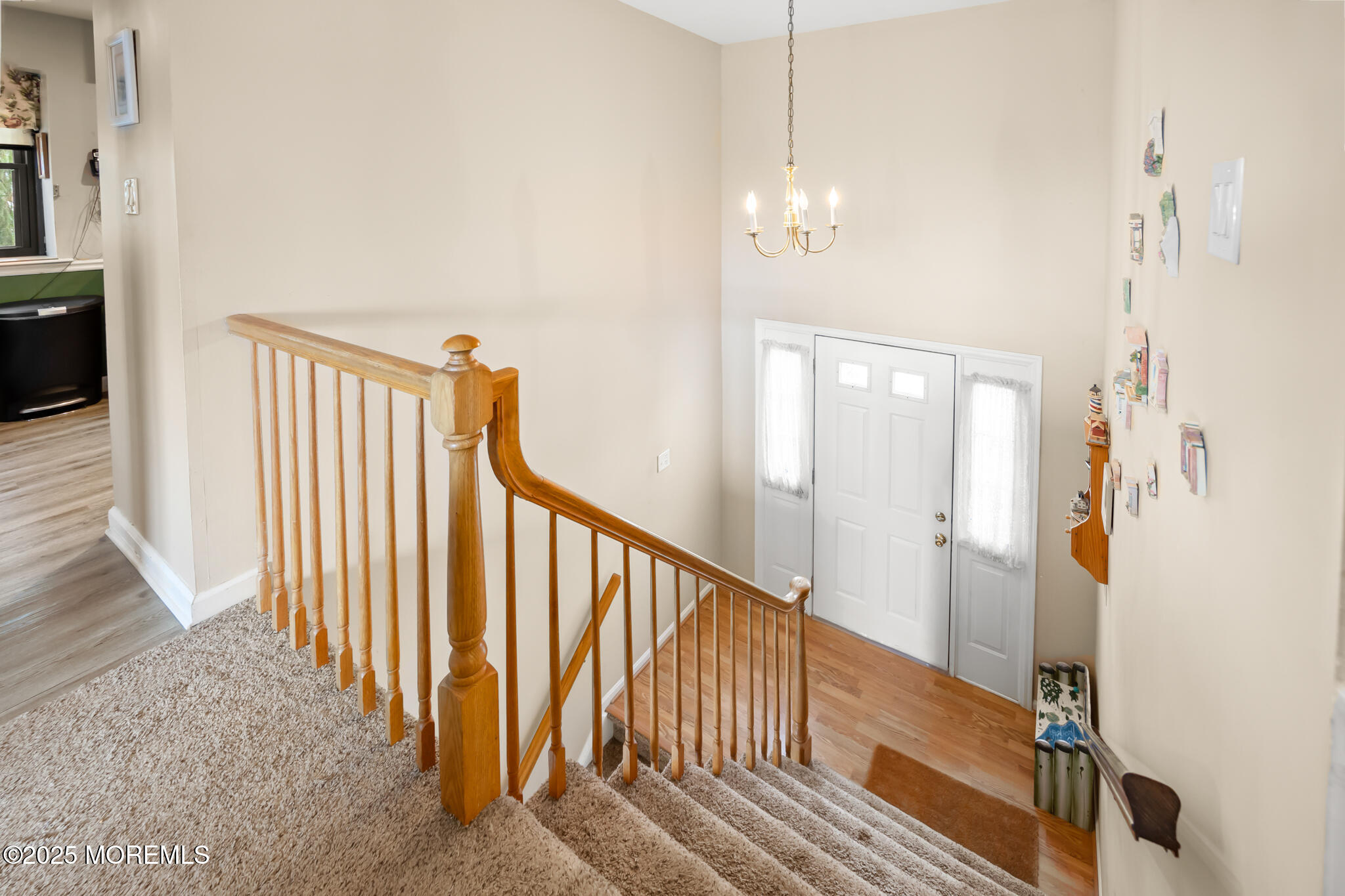 17 Garden Way Howell, NJ 07731 - Photo 7 of 54 a view of a hallway with wooden floor and staircase