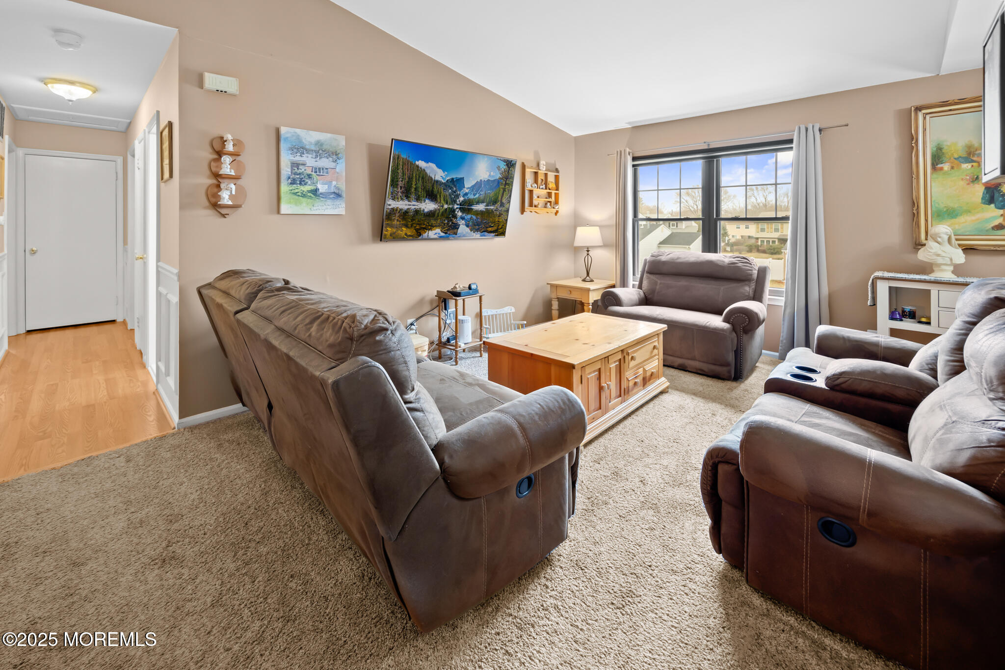 17 Garden Way Howell, NJ 07731 - Photo 8 of 54 a living room with furniture two windows and a flat screen tv