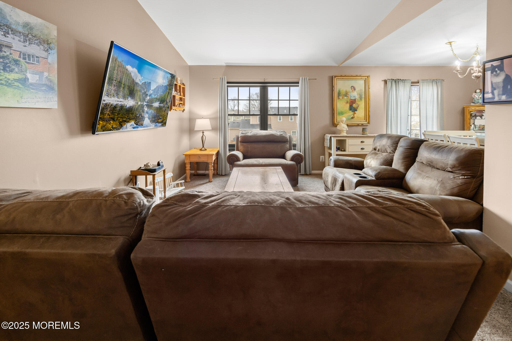 17 Garden Way Howell, NJ 07731 - Photo 9 of 54 a living room with a couch and a large window