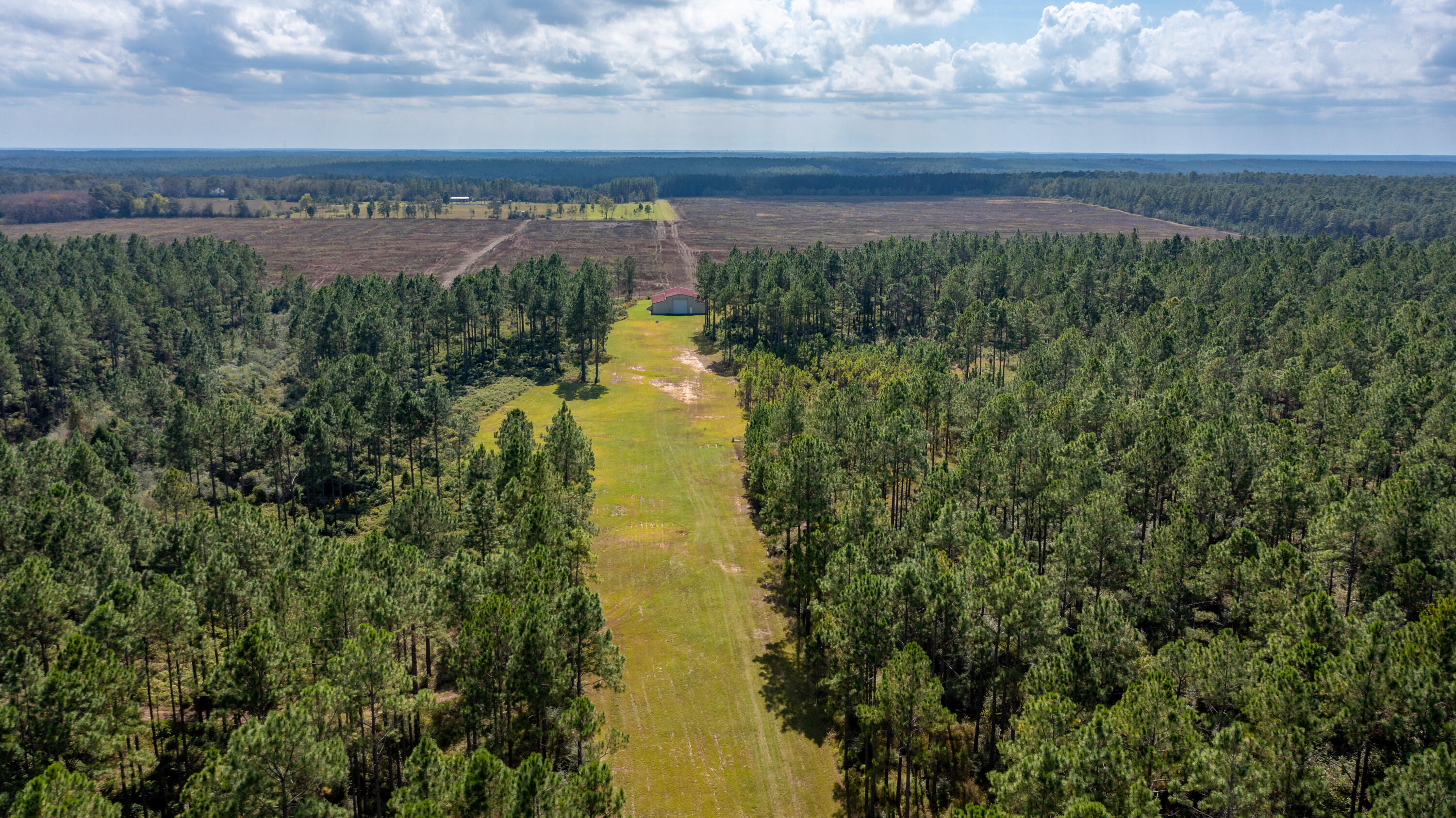 79-acres Bob Brooks Road Baker, FL 32531 - Photo 14 of 14 a view of a lake from a yard