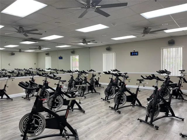 a very nice looking room with gym equipment