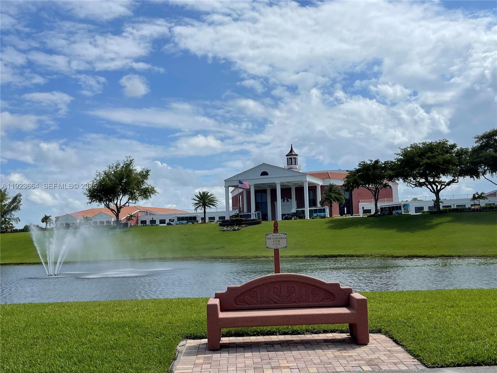 119 Tilford F, Unit 119 Deerfield Beach, FL 33442 - Photo 6 of 36 an aerial view of a house with a yard