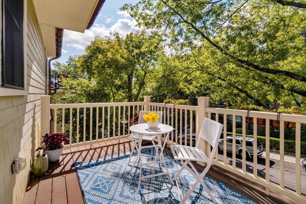 27 Summit Avenue, Unit 2 Brookline, MA 02446 - Photo 14 of 34 a view of balcony with wooden floor and outdoor seating