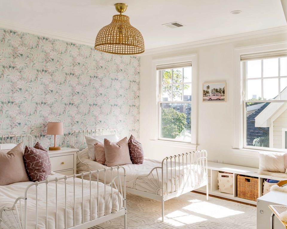 27 Summit Avenue, Unit 2 Brookline, MA 02446 - Photo 24 of 34 a bedroom with furniture and a window
