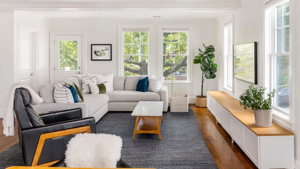 27 Summit Avenue, Unit 2 Brookline, MA 02446 - Photo 3 of 34 a living room with furniture and a large window