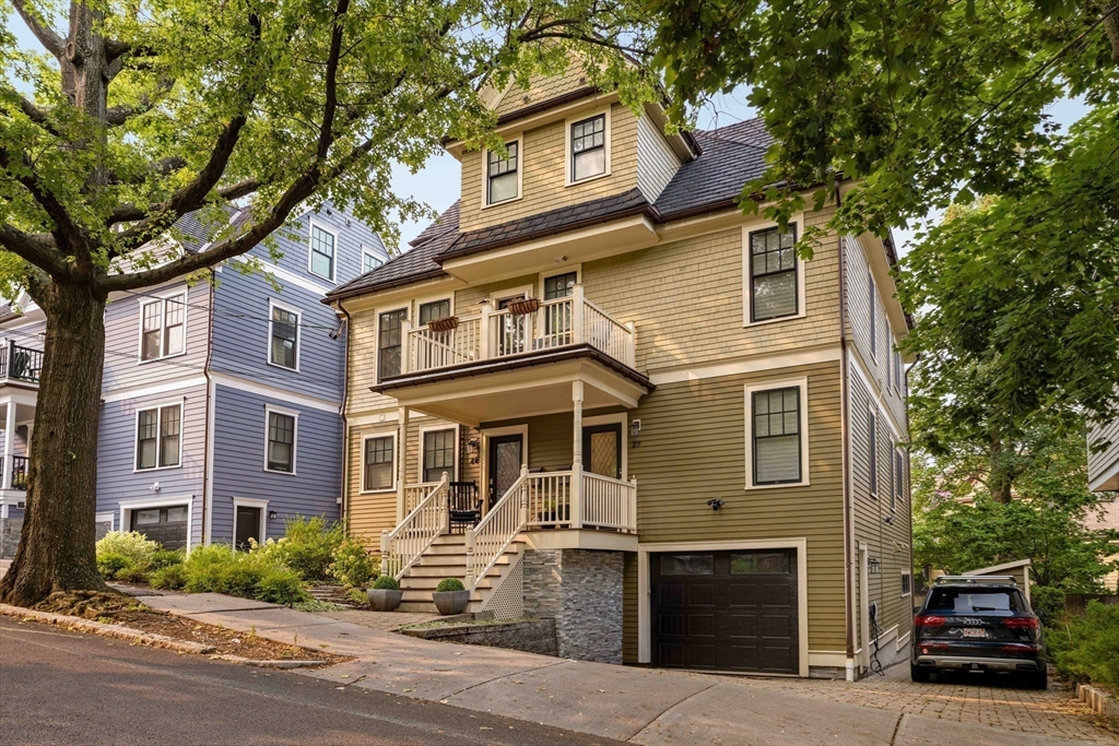 27 Summit Avenue, Unit 2 Brookline, MA 02446 - Photo 34 of 34 a car parked in front of a building