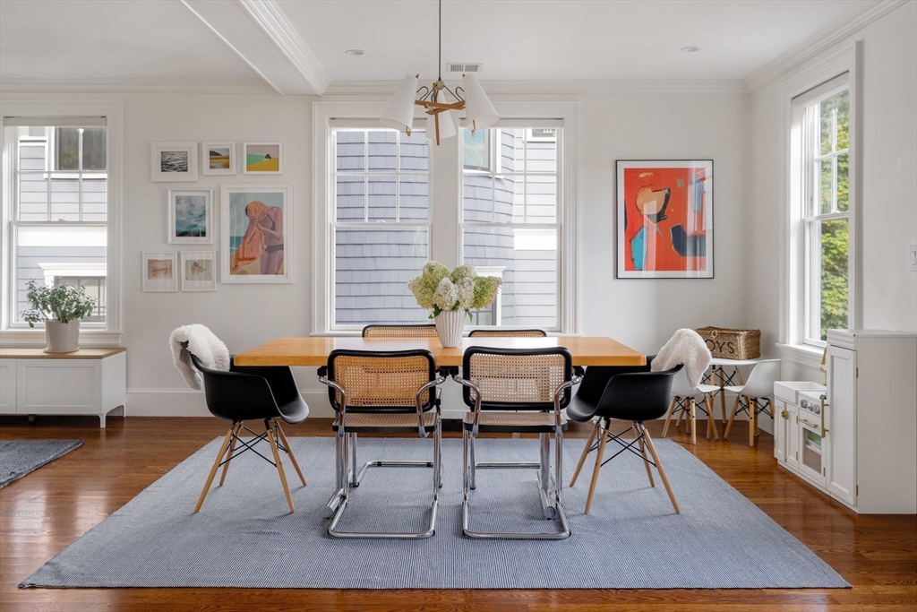 27 Summit Avenue, Unit 2 Brookline, MA 02446 - Photo 5 of 34 a view of a dining room with furniture window and wooden floor