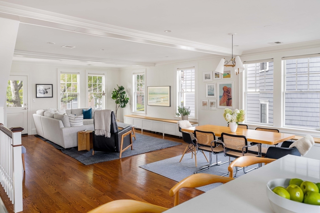 27 Summit Avenue, Unit 2 Brookline, MA 02446 - Photo 7 of 34 a living room with furniture kitchen view and large windows