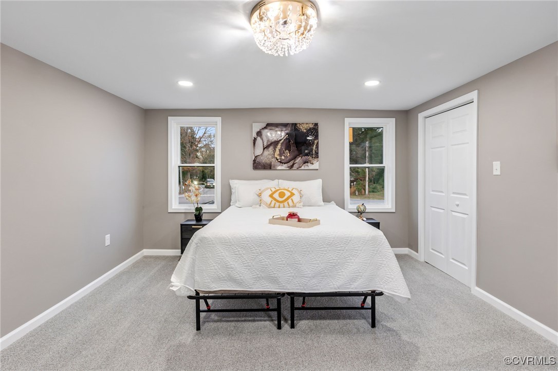 9531 Reams Road Chesterfield, VA 23236 - Photo 17 of 34 a bedroom with a bed and a painting on the wall