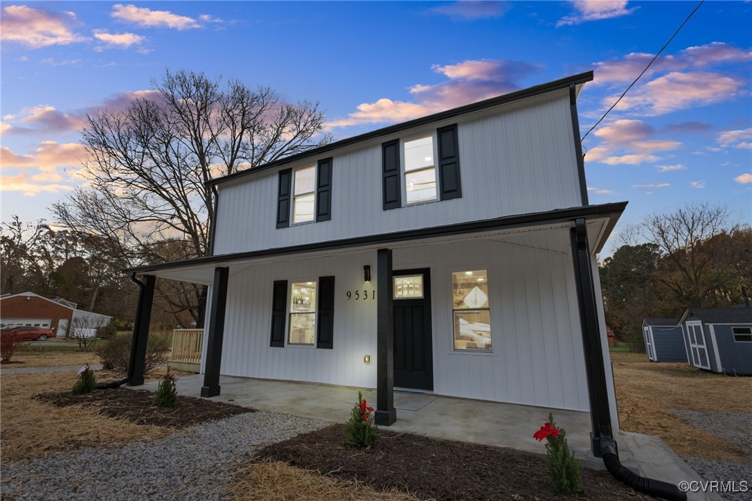 9531 Reams Road Chesterfield, VA 23236 - Photo 2 of 34 a front view of a house with garden