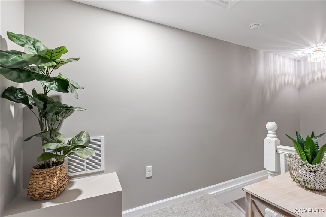 9531 Reams Road Chesterfield, VA 23236 - Photo 21 of 34 a view of a room with a potted plant on a table
