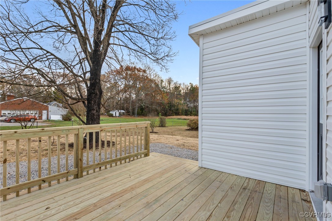 9531 Reams Road Chesterfield, VA 23236 - Photo 30 of 34 a view of a deck with trees