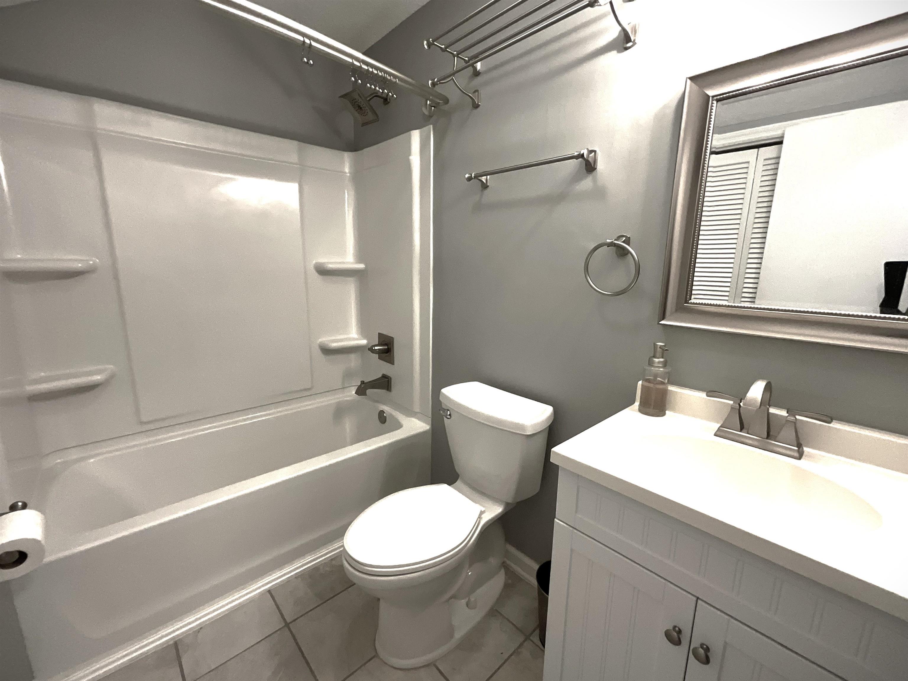1880 Colony Drive, Unit 11O Surfside Beach, SC 29575 - Photo 9 of 17 Full bath featuring vanity, shower / washtub combination, and tile patterned floors