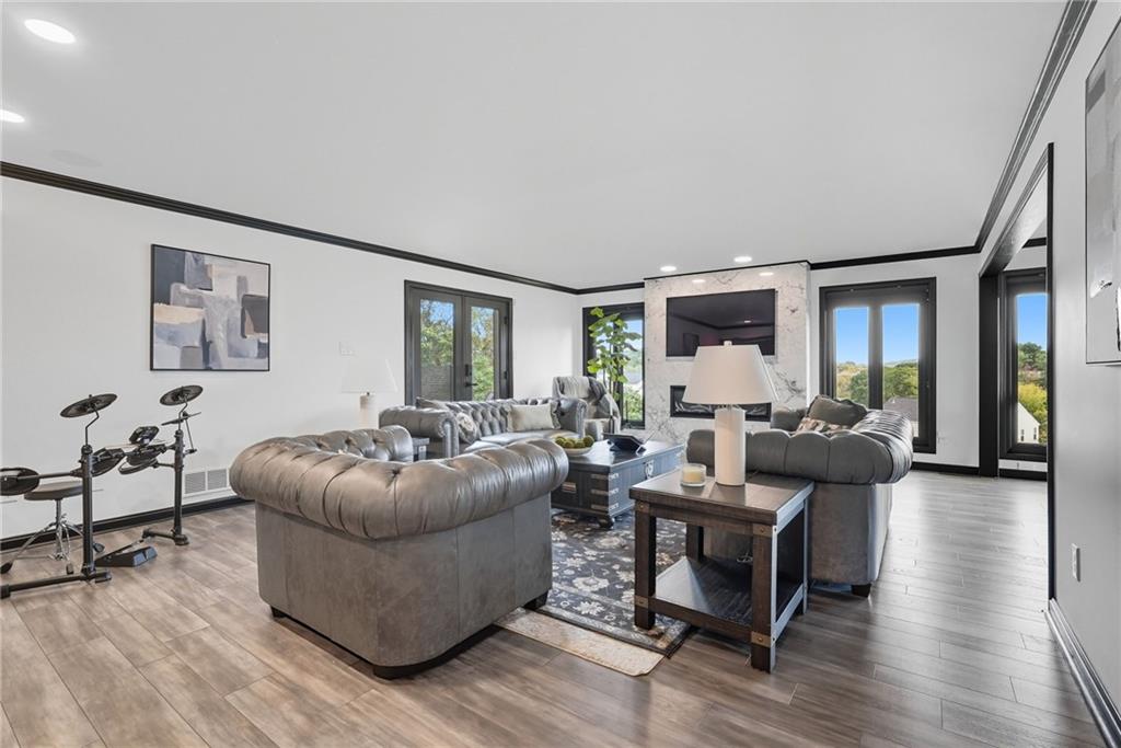 2460 Nicholson Road Sewickley, PA 15143 - Photo 14 of 50 a living room with furniture and a large window