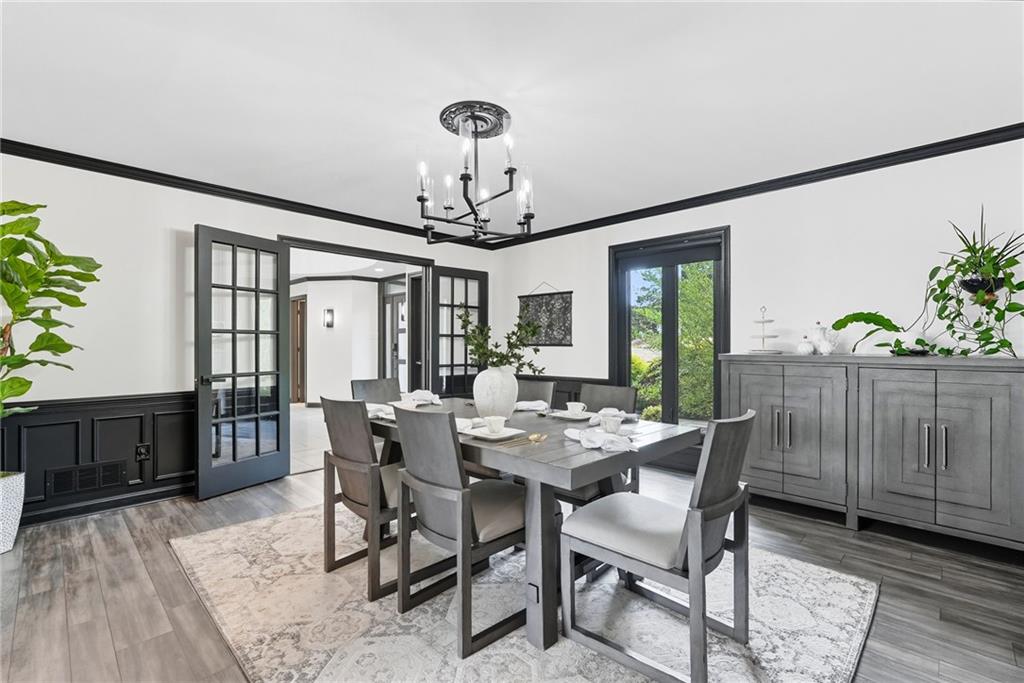 2460 Nicholson Road Sewickley, PA 15143 - Photo 16 of 50 a view of a dining room with furniture window and wooden floor
