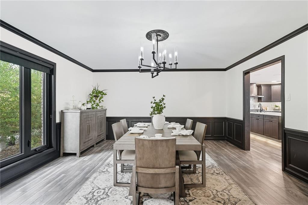 2460 Nicholson Road Sewickley, PA 15143 - Photo 17 of 50 a view of a dining room with furniture window and wooden floor