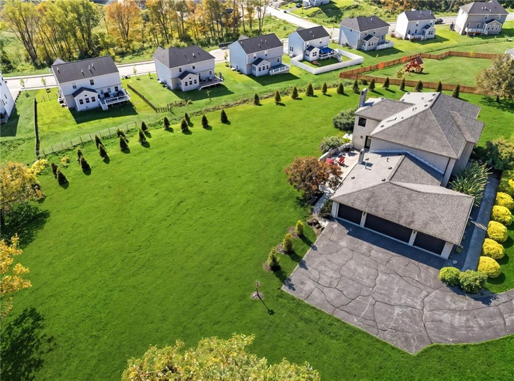 2460 Nicholson Road Sewickley, PA 15143 - Photo 2 of 50 an aerial view of a house with a garden