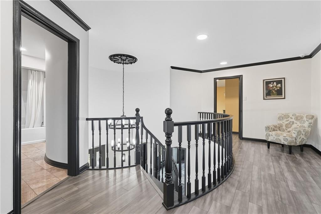 2460 Nicholson Road Sewickley, PA 15143 - Photo 32 of 50 a view of hallway with furniture and wooden floor
