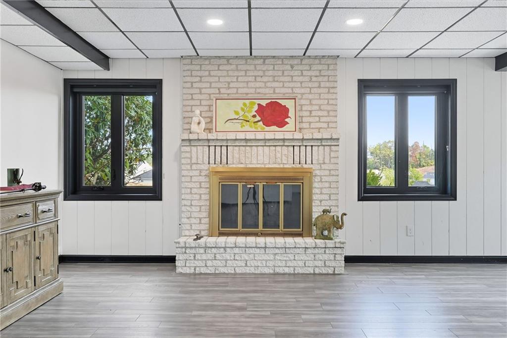 2460 Nicholson Road Sewickley, PA 15143 - Photo 35 of 50 a view of an empty room with a window and wooden floor