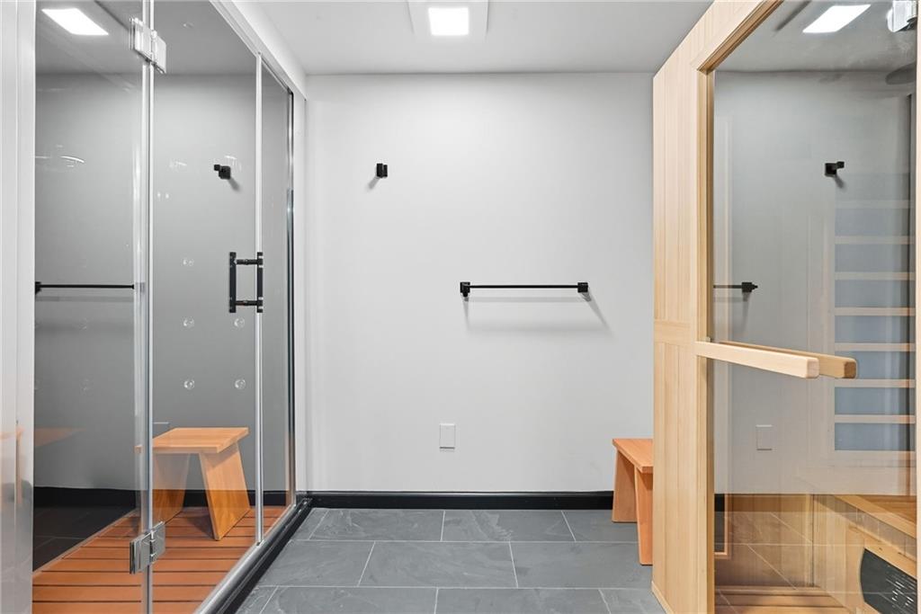 2460 Nicholson Road Sewickley, PA 15143 - Photo 37 of 50 a bathroom with a shower and a sink