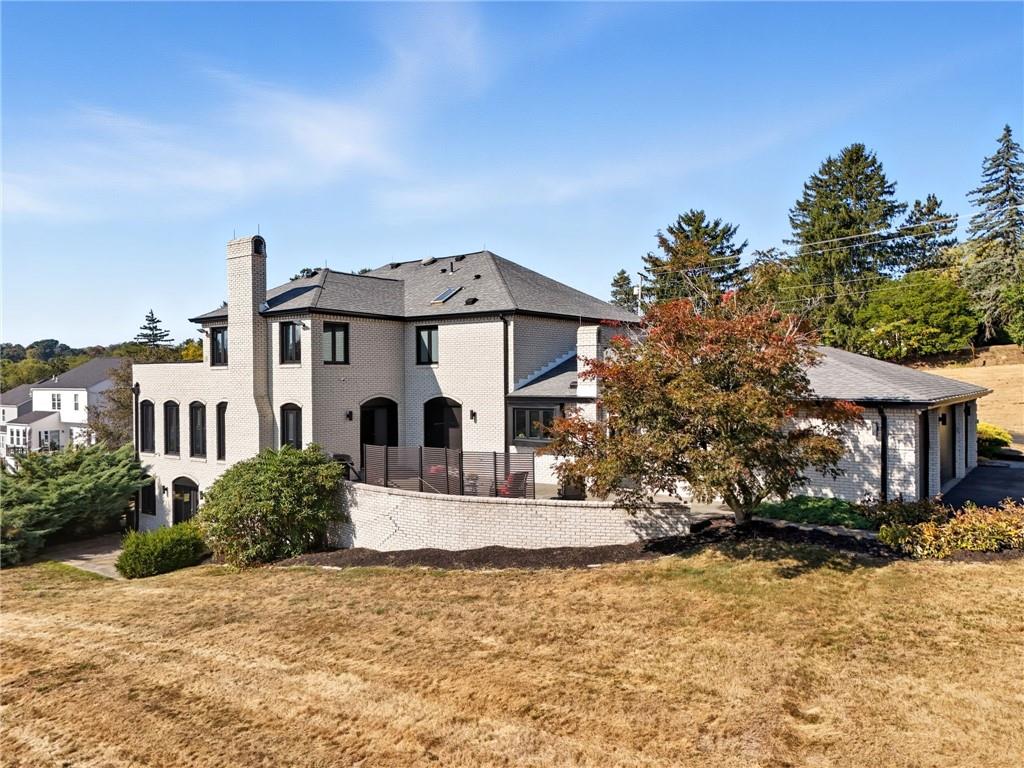 2460 Nicholson Road Sewickley, PA 15143 - Photo 46 of 50 a front view of a house with a yard