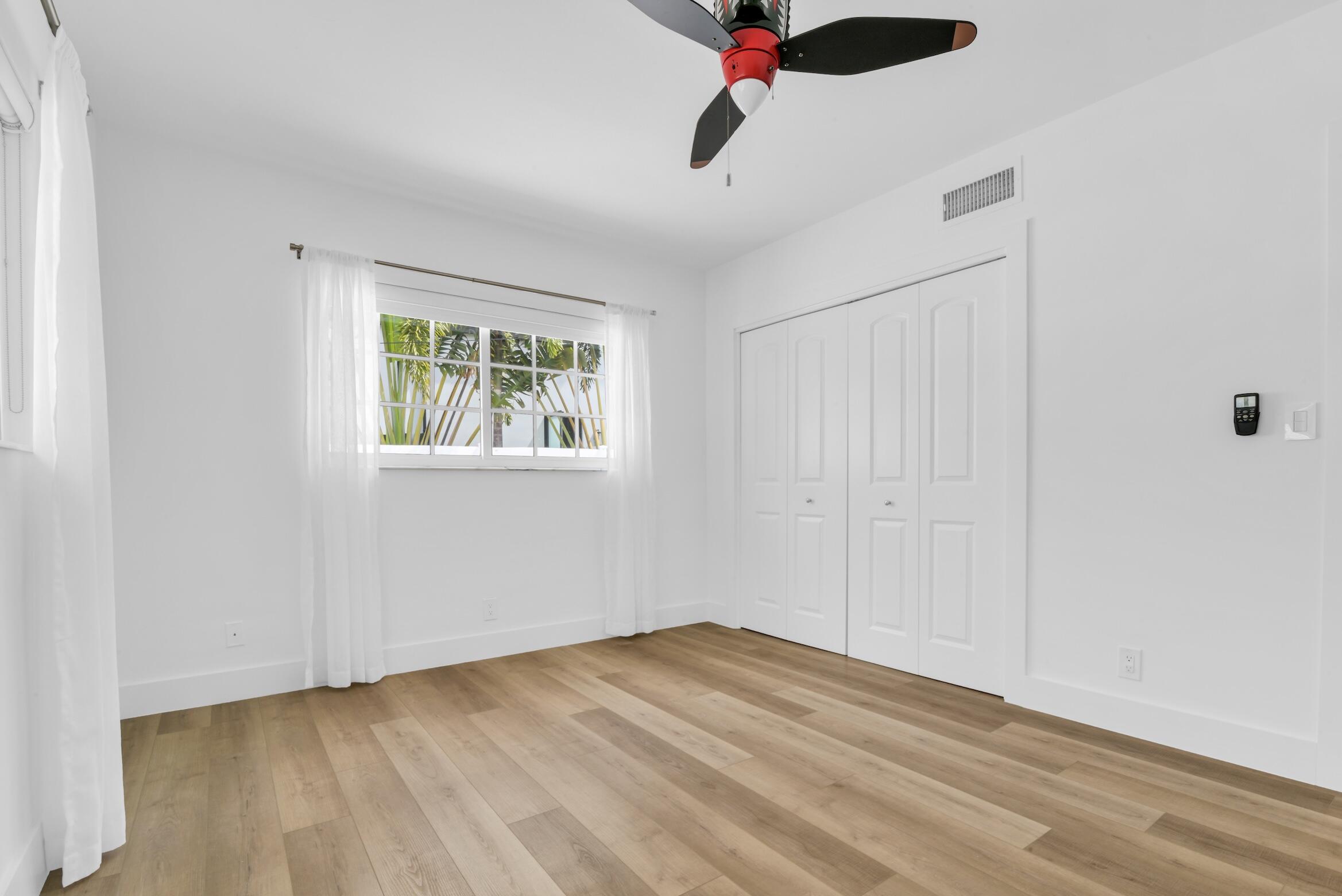 701 Appleby Street Boca Raton, FL 33487 - Photo 34 of 47 a view of an empty room with a window