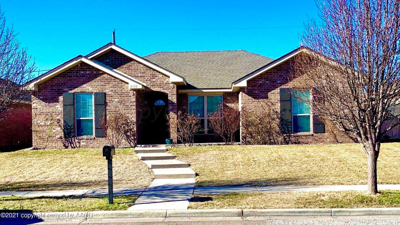 4512 Ross Street Amarillo, TX 79118 - Photo 1 of 24 a front view of house with yard
