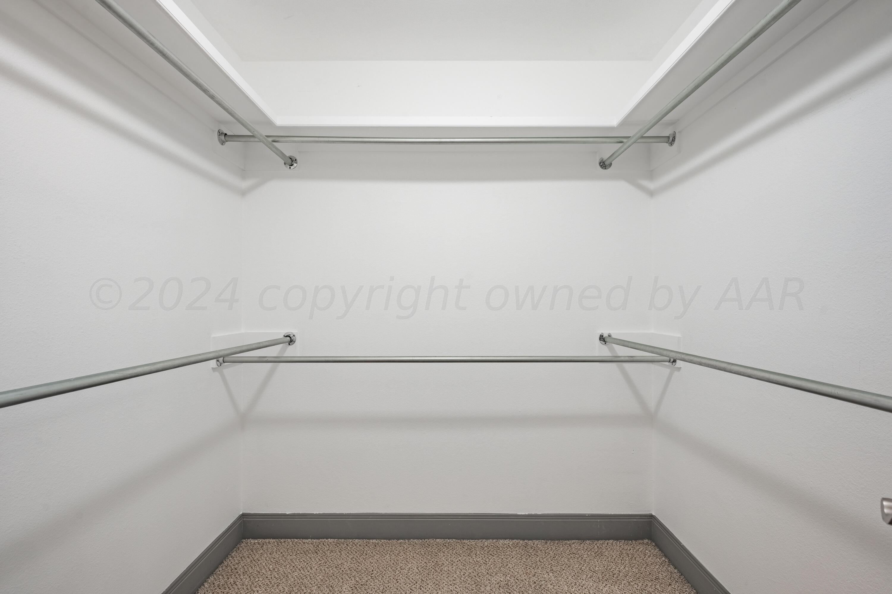 4512 Ross Street Amarillo, TX 79118 - Photo 13 of 24 a view of walk in closet