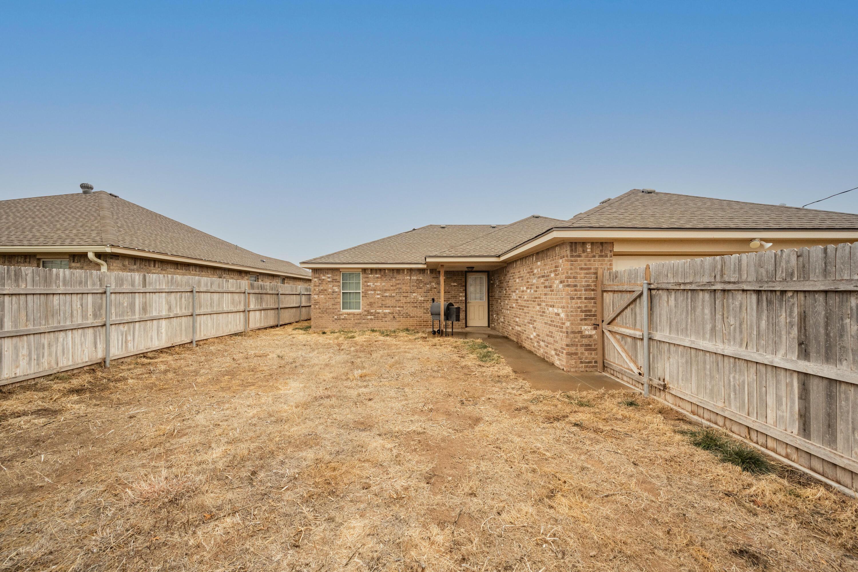 4512 Ross Street Amarillo, TX 79118 - Photo 23 of 24 a view of a backyard