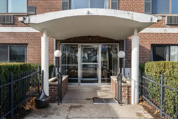 a front view of a house with glass door