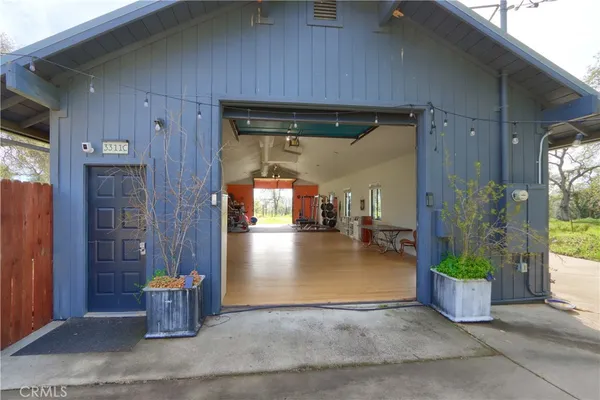 a view of a livingroom with furniture and a window