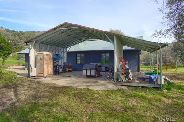 a view of yard with outdoor seating