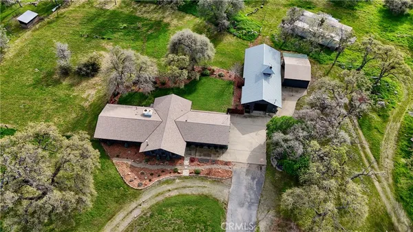 a view of a garden from a balcony