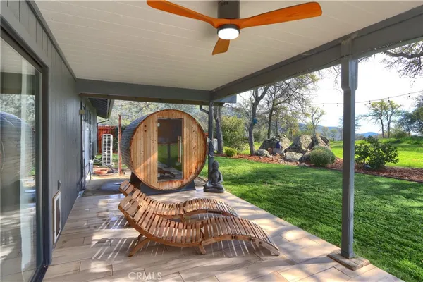 a view of a porch with a backyard