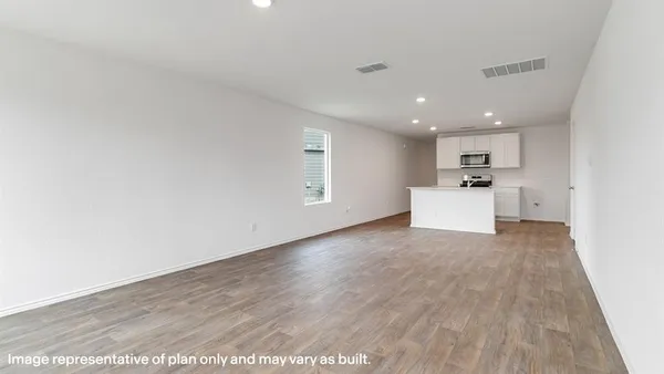 a view of kitchen with wooden floor