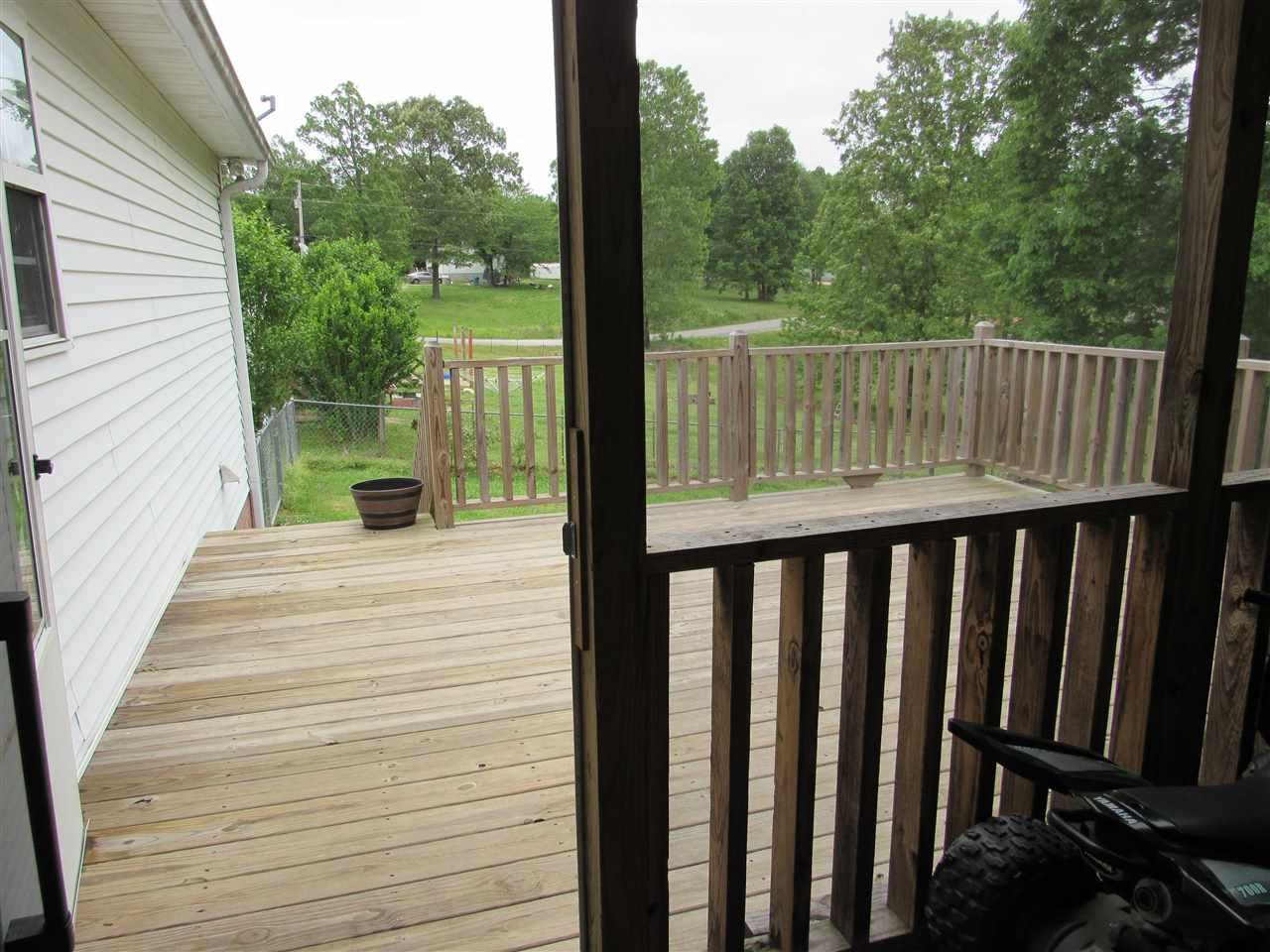 988 Franklin Store Road Lexington, TN 38351 - Photo 15 of 19 a view of a balcony with wooden floor