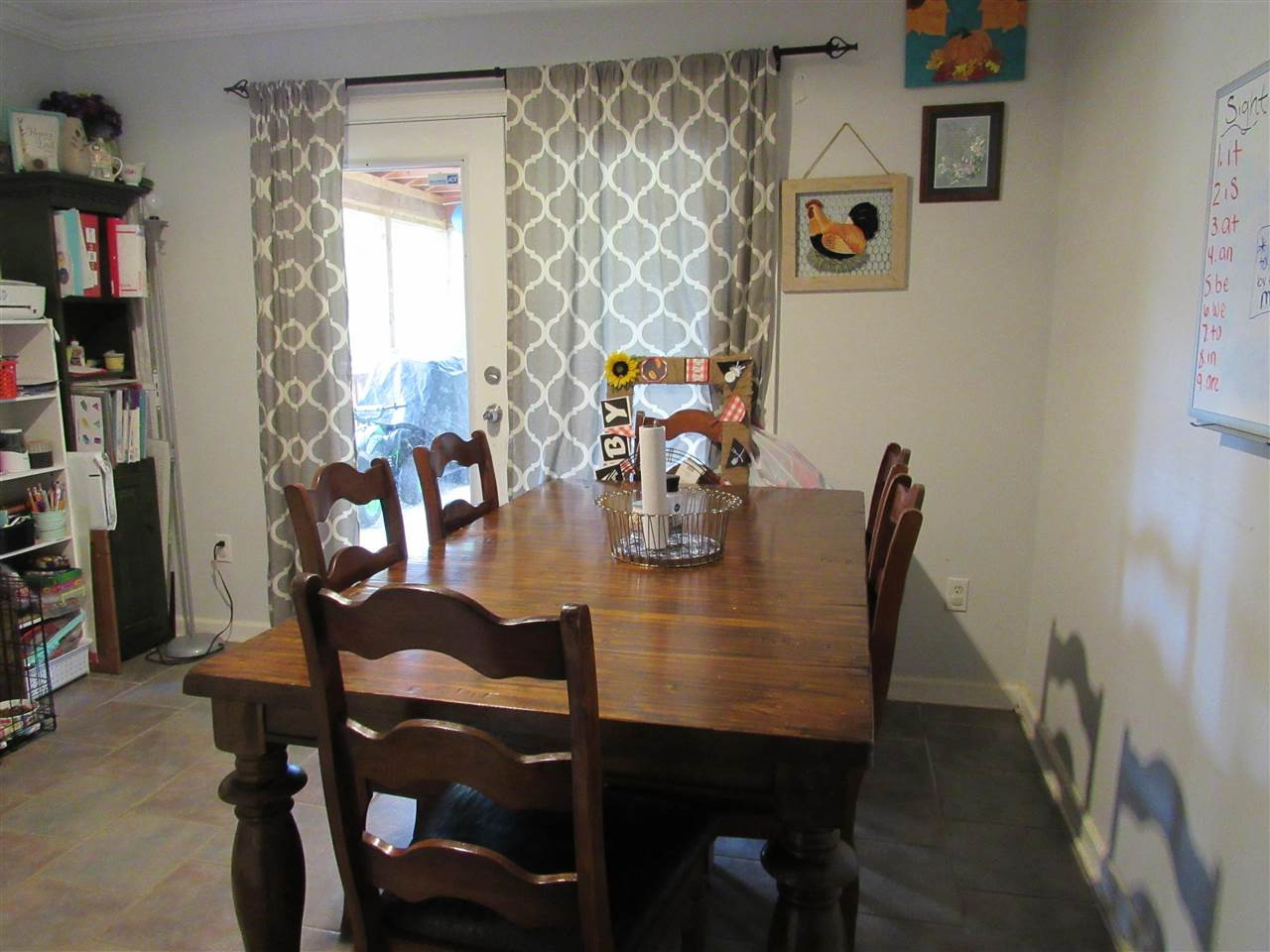 988 Franklin Store Road Lexington, TN 38351 - Photo 7 of 19 a dining room with furniture and window