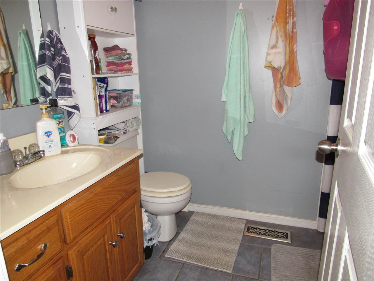 988 Franklin Store Road Lexington, TN 38351 - Photo 9 of 19 a bathroom with a sink toilet and vanity