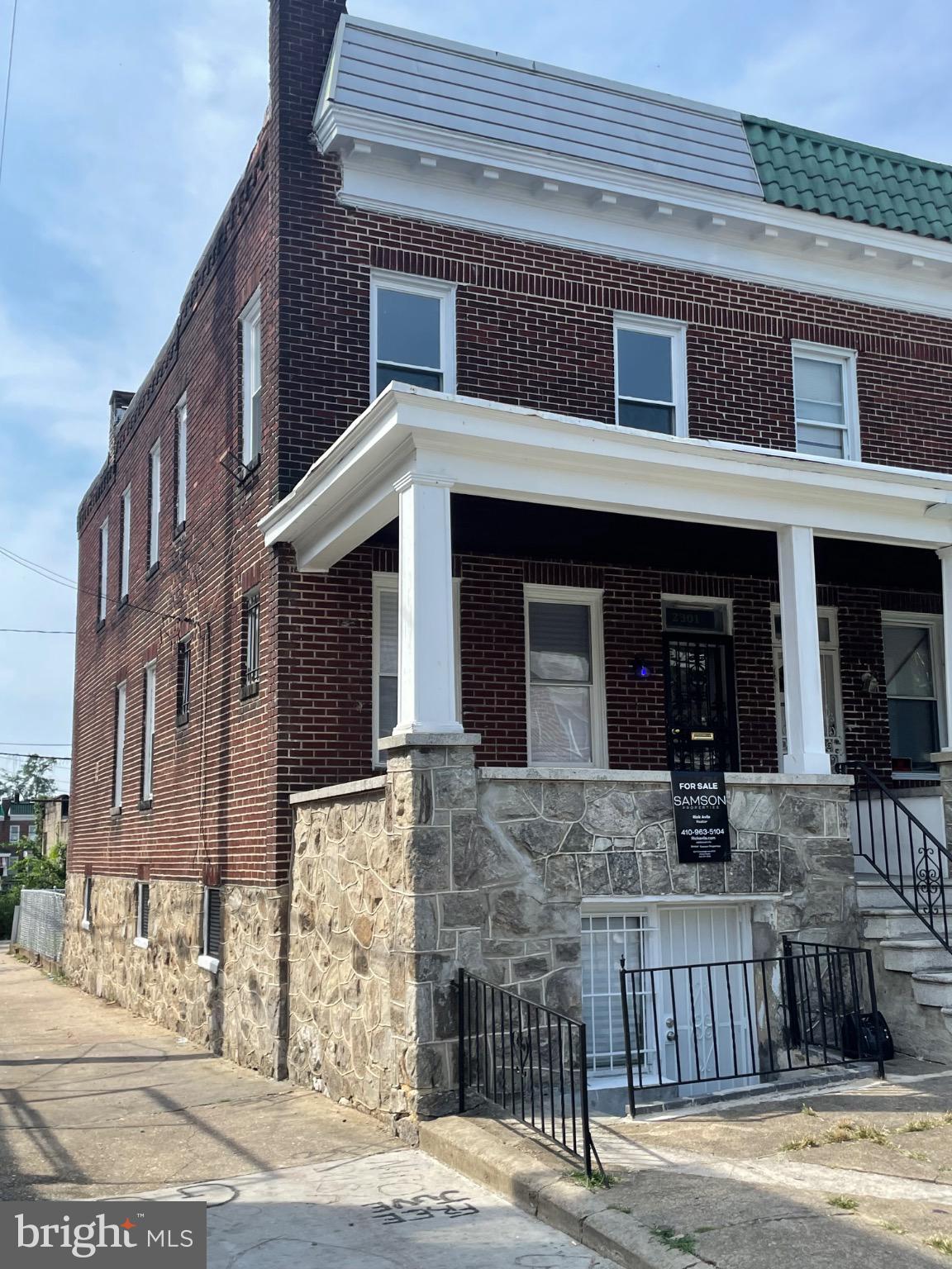 a view of a building with a street