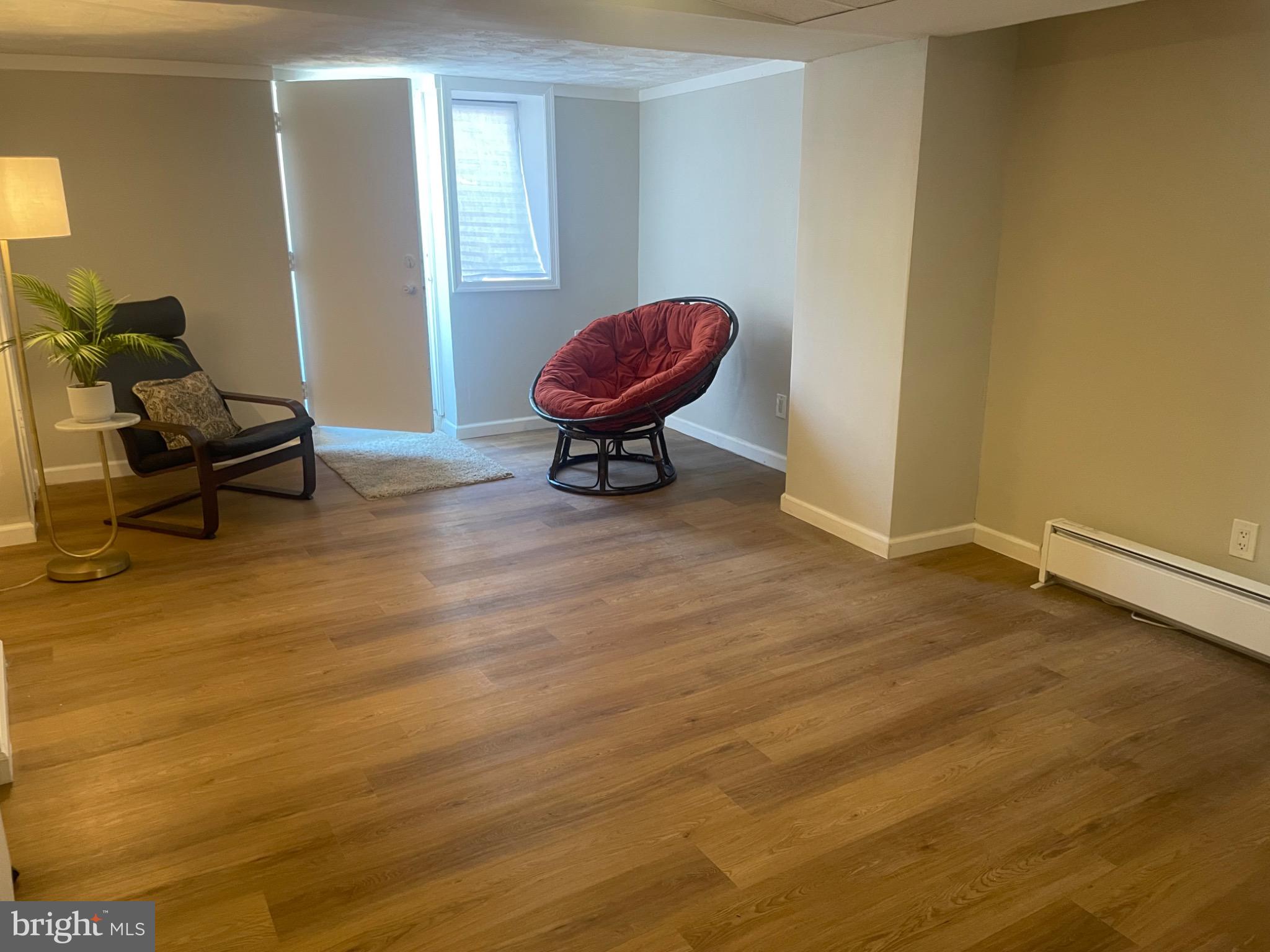 2301 Mosher Street Baltimore, MD 21216 - Photo 25 of 30 a living room with couch and a table