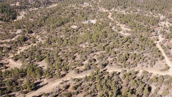 a view of mountain with sunset