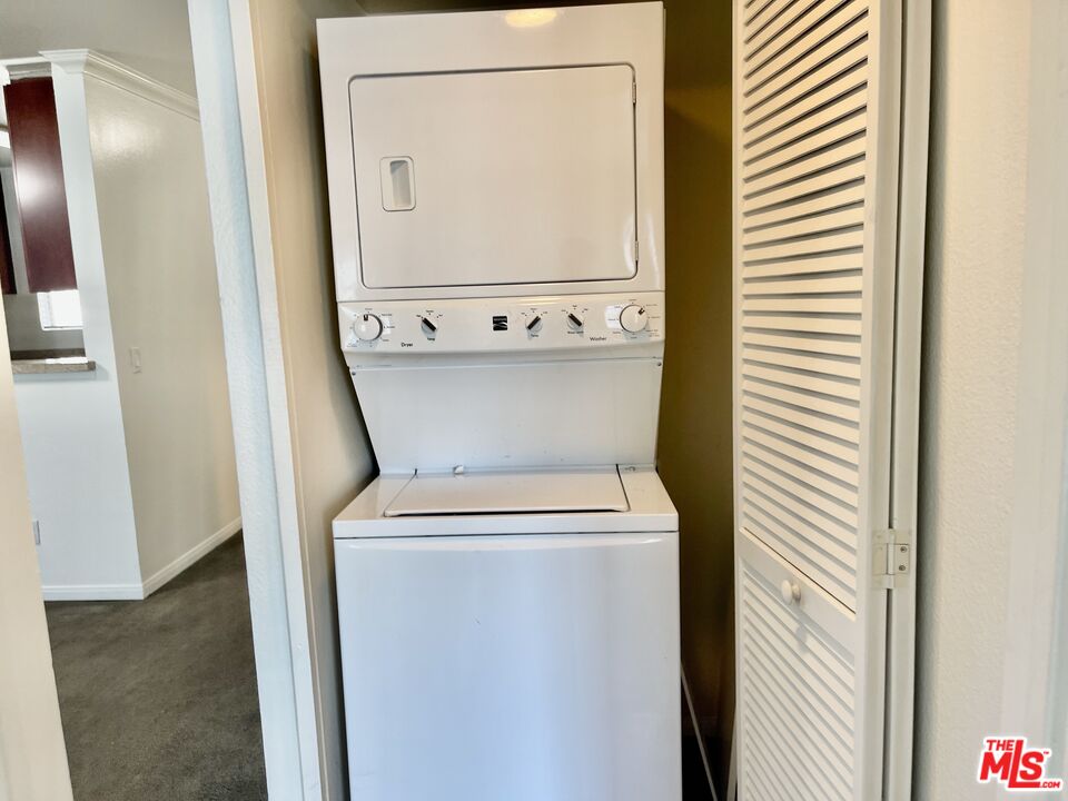 5530 Owensmouth Avenue, Unit 223 Woodland Hills, CA 91367 - Photo 18 of 21 a view of washer and dryer