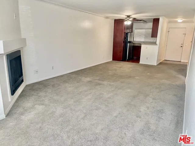 a view of a kitchen with a sink