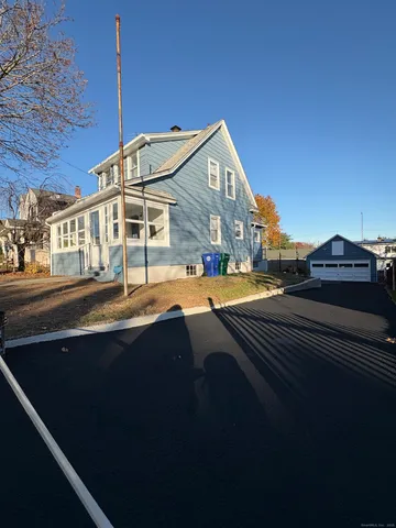 a view of building with view of the street and a building