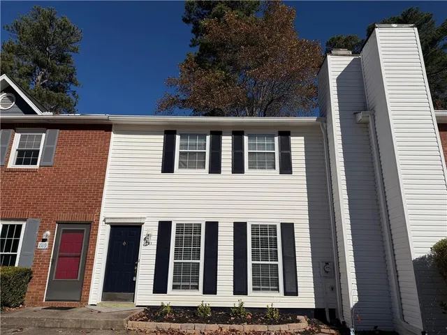 a front view of a house with staircase