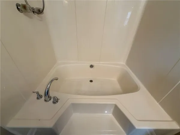 a bathroom with a bathtub