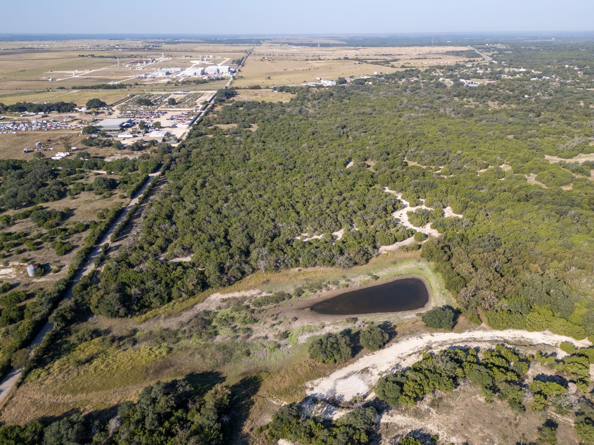112 Loop 308 Briggs, TX 78608 - Photo 26 of 37 View of property location featuring a forest