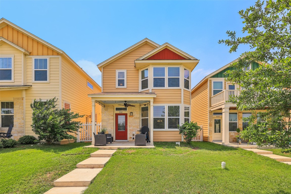 202 Martha Lane Kyle, TX 78640 - Photo 1 of 1 a front view of a house with a yard