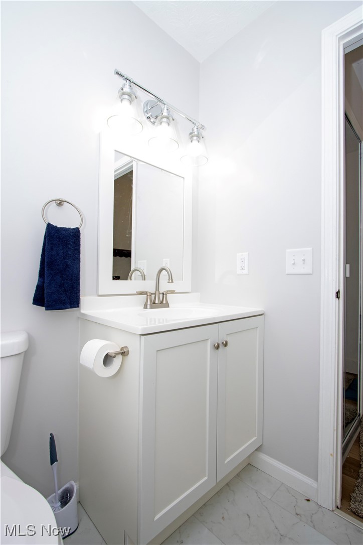 2781 North Firestone Road Wooster, OH 44691 - Photo 23 of 41 Bathroom featuring vanity and toilet