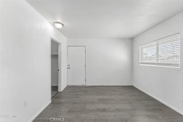 a bathroom with a toilet sink and a shower
